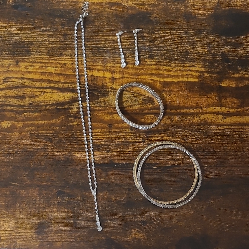 Elegant Silver and Gold Necklace by [Brand]